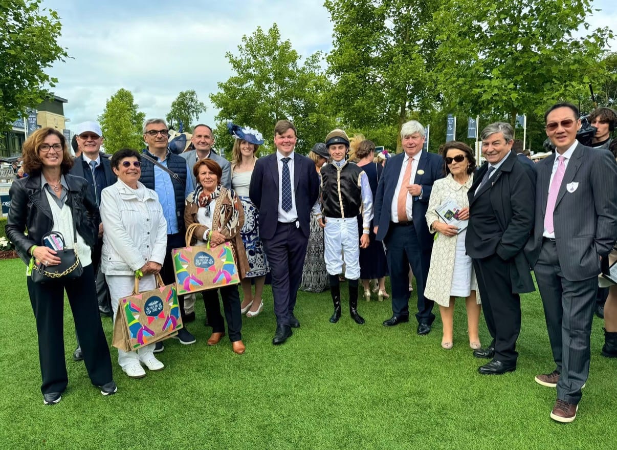 Owners, trainer and jockey celebrating on raceday