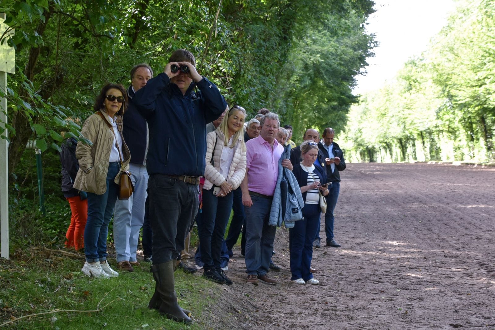 Gavin Hernon and owners watching morning work on the forest gallops